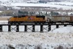 UP SD70M #4367 leads the northbound Cache Valley Local (LCG-41C) on the "Presto Trestle" at Presto Products in Lewiston, Utah April 13, 2022